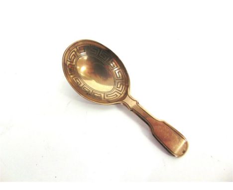 A GEORGE III SILVER CADDY SPOON James Beebe, London 1819, the egg shaped bowl with Greek key pattern border to a a fiddle pat