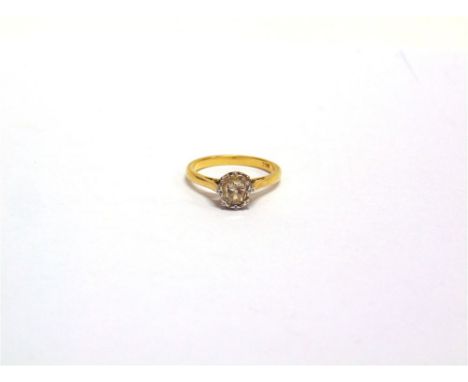 A DIAMOND SINGLE STONE RING stamped '18ct', the illusion set old cut brilliant of approximately 0.4 carats estimated, finger 