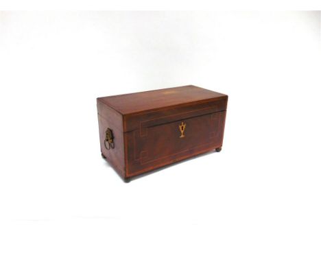 A 19TH CENTURY MAHOGANY TEA CADDY  with line inlay and parquetry decoration, with lion mask handles and on brass ball feet, t