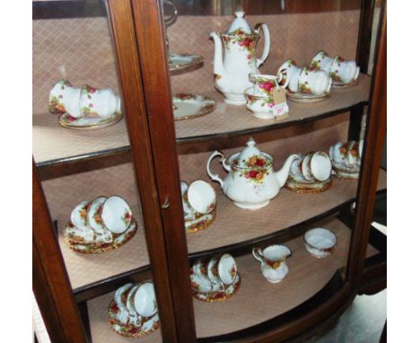 ROYAL ALBERT 'OLD COUNTRY ROSES':  a twelve setting tea service comprising teapot, sugar bowl, milk jug, twelve cups, twelve 