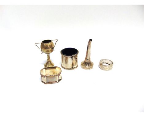 A COLLECTION OF ASSORTED SILVER ITEMS including: three napkin rings; two sugar tongs; a wine funnel spout; a table lighter; m