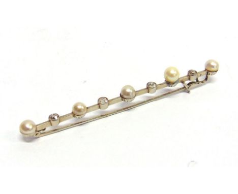 A DIAMOND AND PEARL BAR BROOCH stamped 'Plat & 18ct W.G.D.', the five pearls alternate set with four old cut diamonds totalli