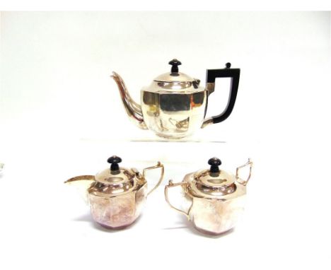 A THREE PIECE TEA SERVICE stamped 'Sterling' possibly Indian, circa 1920, of octagonal outline, 776g (25 troy oz) gross
