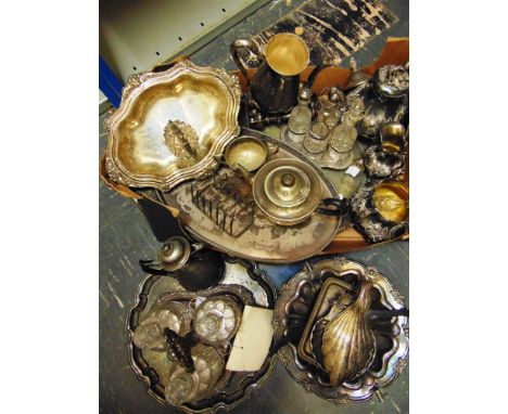 A COLLECTION OF ELECTROPLATED WARES comprising a three piece tea service; a three bottle decanter waiter with bottles; a crue