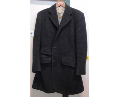 A GENT'S BLACK HUNT COAT with check lining, size 36/38'