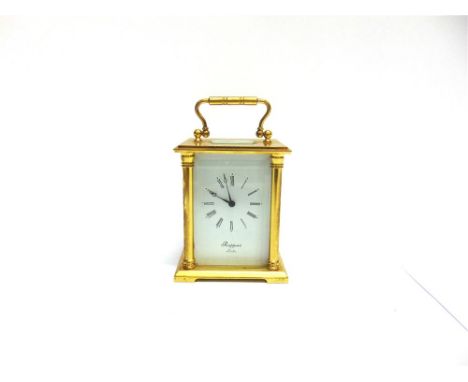 A CONTEMPORARY CARRIAGE CLOCK by 'Rapport, London' with enamel dial and striking movement, and contained in a brass case, 10c
