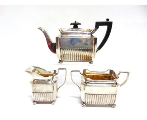 A LATE VICTORIAN MATCHED SILVER THREE PIECE TEA SERVICE by Henry Stratford, Sheffield 1890-91, of gadrooned rectangular cante