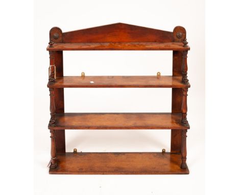 A set of 19th Century mahogany wall hanging shelves, the tiers united by turned columns, 75cm wide CONDITION REPORT: All shel