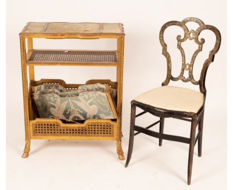 An ebonised chair inlaid mother-of-pearl, a cane seat gilded chair and a cane panelled magazine shelf CONDITION REPORT: Condi