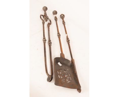 A set of three burnished steel fire irons with button finials and knopped stems/Provenance: Spetchley Park, Worcestershire CO