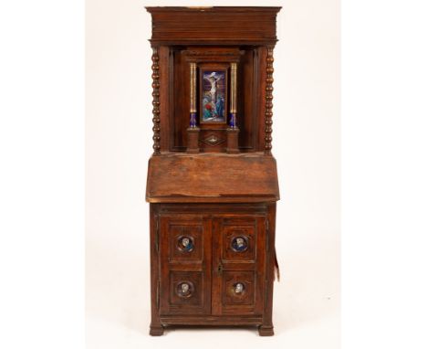 An 18th Century and later walnut and oak prie-dieu, mounted with Limoges style enamels, possibly by Samson of Paris, late 19t