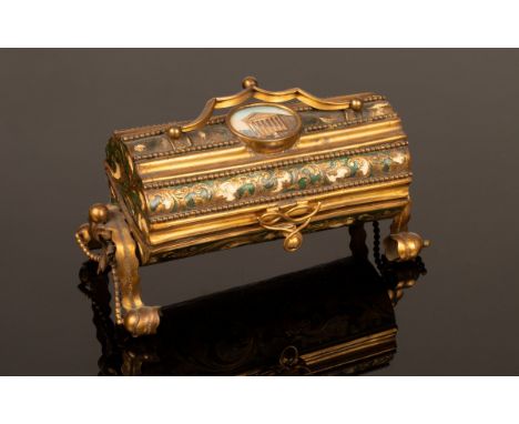 A mid 19th Century gilt metal etui, the gold, cream and gilt painted cassone with oval stipple print to the cover on four scr