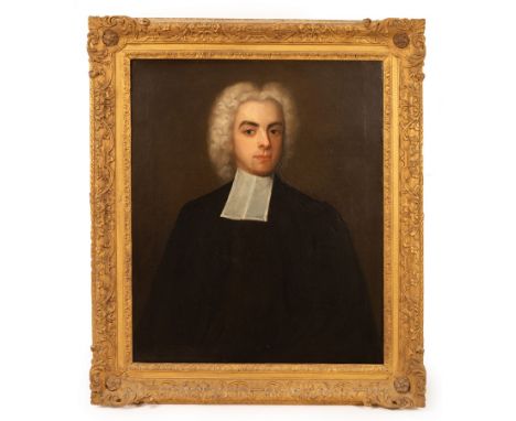 English School, mid 18th Century/Portrait of a Cleric/bust length, wearing a wig and clerical dress/oil on canvas, 74.5cm x 6