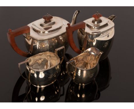 A four-piece silver tea set, SB & S Ltd., Birmingham 1920, comprising teapot, hot water jug, sugar basin and jug, the teapot 