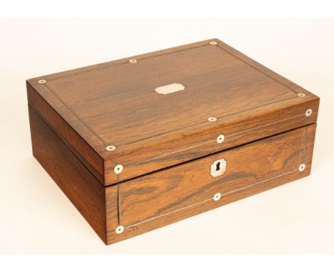 A mid 19th Century rosewood workbox inlaid mother-of-pearl, with yellow lined fitted interior including ivory spools and othe