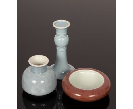 Three monochrome Chinese scholar's porcelain items, 20th Century, one light blue Gu-shape vase, 14.5cm high and another small