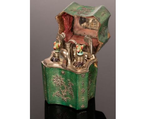 A mid 19th Century shagreen etui of serpentine outline, with steel cut decoration and agate panel to the cover, the interior 