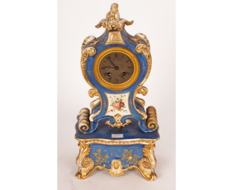 A Paris porcelain cased mantel clock, the silvered dial with bell striking movement and silk suspension, the case with floral