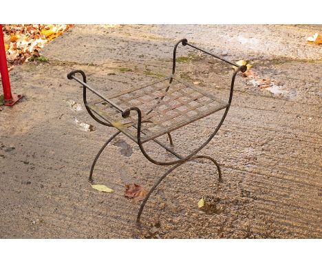 A wrought iron garden seat with interwoven slatted base, 70cm wide CONDITION REPORT: Condition information is not usually pro