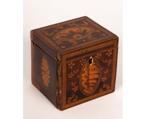 A George III mahogany and marquetry tea caddy of cube form, inlaid with shell paterae and floral sprigs, 12.5cm wide CONDITIO
