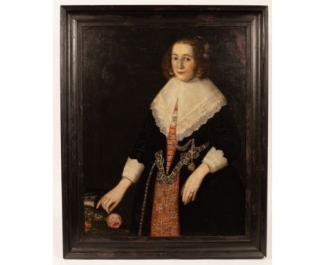 Dutch School, early 17th Century/Portrait of a Lady/three-quarter length, wearing a black dress with a broad lace collar, a r