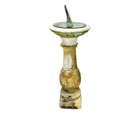 A carved sandstone baluster shaped sundial, the circular bronze top possibly signed THO. HEATH LONDON, later elements, 134cm 