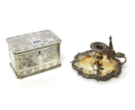 A plated rectangular hinge lidded twin compartment tea caddy, with foliate decoration and a Sheffield plated chamber candlest