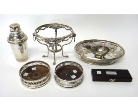 Two various silver mounted circular bottle coasters, having wooden bases, a foreign plated sauceboat, a silver cased Yard-O-L