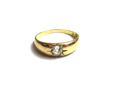 A gold and diamond set single stone ring, gypsy set with a cushion shaped diamond, detailed 8.8.56, ring size O and a half, w