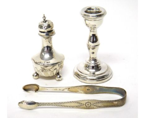 Silver and silver mounted wares, comprising; a pair of sugar tongs with bright cut engraved decoration, circa 1800, a peppere