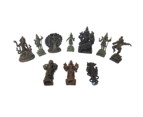 A group of ten small Indian bronze figures, various dates, including a figure of Shiva and Parvati; a figure of bala Krishna 