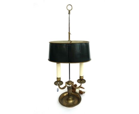 A brass bouillotte lamp, early 20th century, with adjustable twin sconces and green oval tin shade on circular base, 69.5cm h