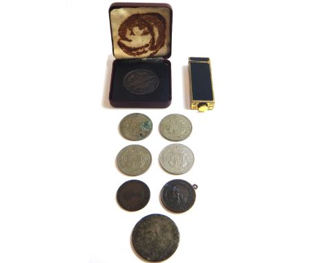 A Dunhill rectangular gilt metal and black lacquer cased gas lighter, a George III crown, four Elizabeth II half crowns, a Ge