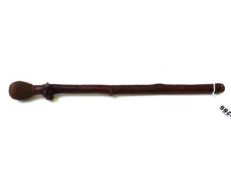 An unusual sailor's treen line thrower or cosh baton, 19th century, with rattan bound bulbous lead weight atop a naturalistic