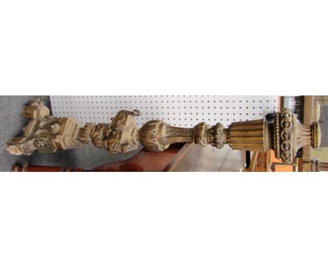 A 19th century Italian polychrome painted and gilded altar candlestick, 123cm high.