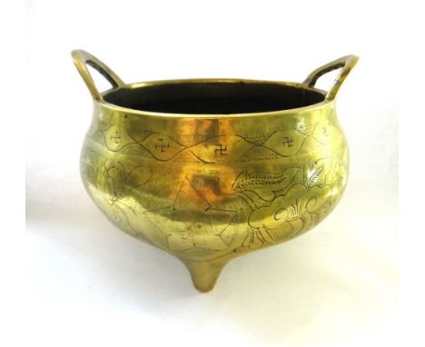 A Chinese bronze censer, probably circa 1900, of squat form, with two upright handles and on three peg supports, incised with
