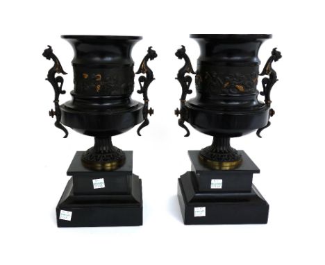 A pair of Victorian black slate garnitures of two handled urn form, a copper hunting horn by Swaine & Adeney, a flatback meta