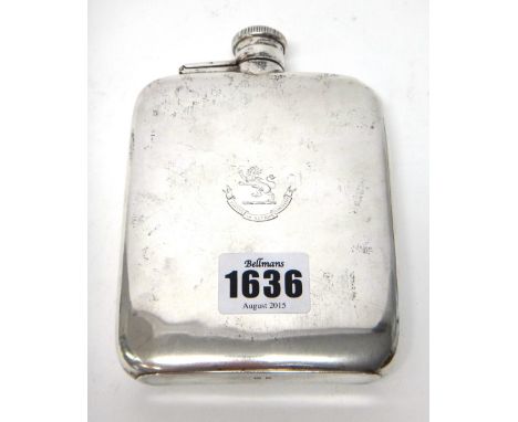 A silver curved rectangular spirit flask, crest and motto engraved, Birmingham 1914, weight 224gms. 