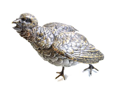 An Austrian cold painted bronze model of a partridge, early 20th century, with wings outspread and beak open, 17.3cm high. 