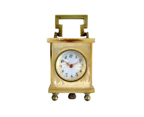 A Swiss rectangular mother of pearl cased miniature carriage clock, the engine turned pale blue enamelled dial with black Ara