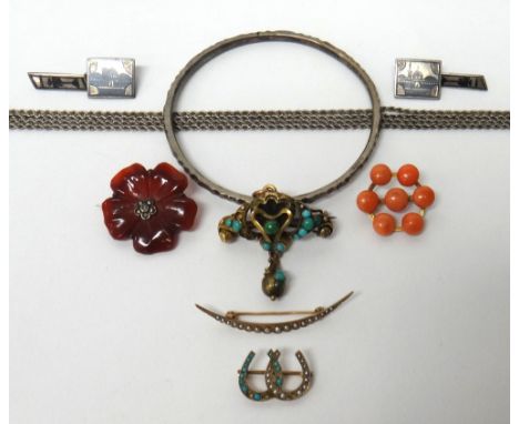 A Victorian turquoise set brooch, in a scrolling design, a gold and seed pearl set crescent brooch, a gold, turquoise and see