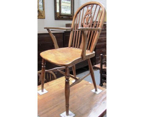 A set of six 19th century and later stick back dining chairs with pierced splat and turned supports, to include one carver. 