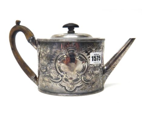 A George III silver teapot, of oval form, with later floral, foliate and scroll embossed decoration and with wooden fittings,