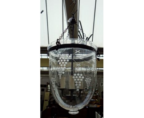 An Indian style Hundi lantern with engraved bowl, metal mounts and a three light fitment. 