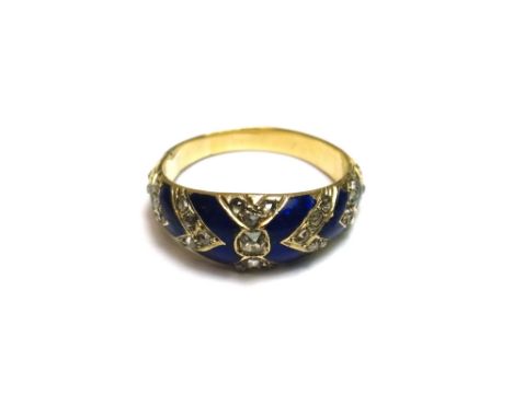 A rose diamond and blue enamelled ring, of tapered form, mounted with the principle cushion shaped diamond at the centre and 