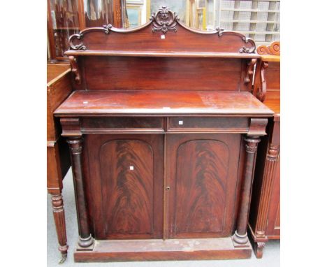 A Victorian mahogany shelf back chiffonier, with pair of drawers over cupboards flanked by turned columns, 108cm wide.