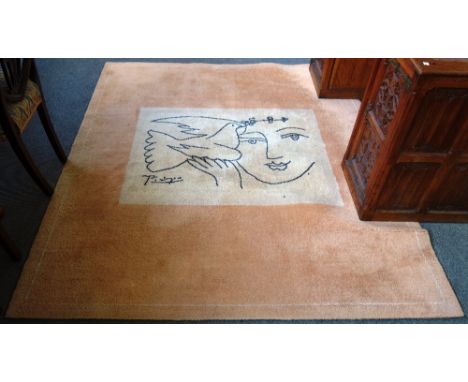 A wool tapestry "Le Visage de la Paix" after Pablo Picasso in colours with embroidered signature, numbered '194/500' and date