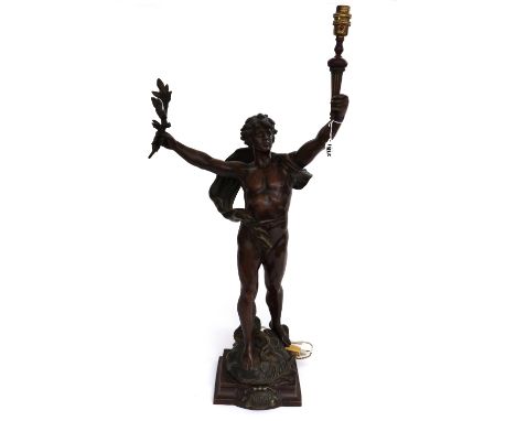 A patinated spelter figural table lamp, after Moreau 'Primax', modelled and cast as a naked man holding a torch and a laurel 