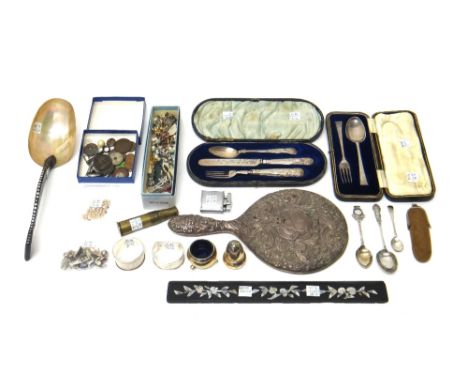 A silver christening spoon and fork, Sheffield 1915, cased, further silver, comprising; a mother of pearl folding fruit knife