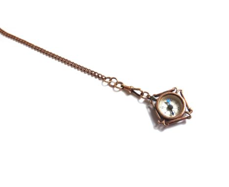 A gentleman's 9ct gold curb link watch Albert chain, fitted with two swivels, gross weight 13 gms and a 9ct gold mounted comp